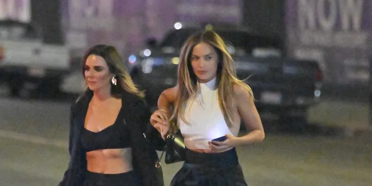 Margot Robbie Turns Heads in Backless Halter and Sky-High Heels at Cara Delevingne’s Birthday Bash